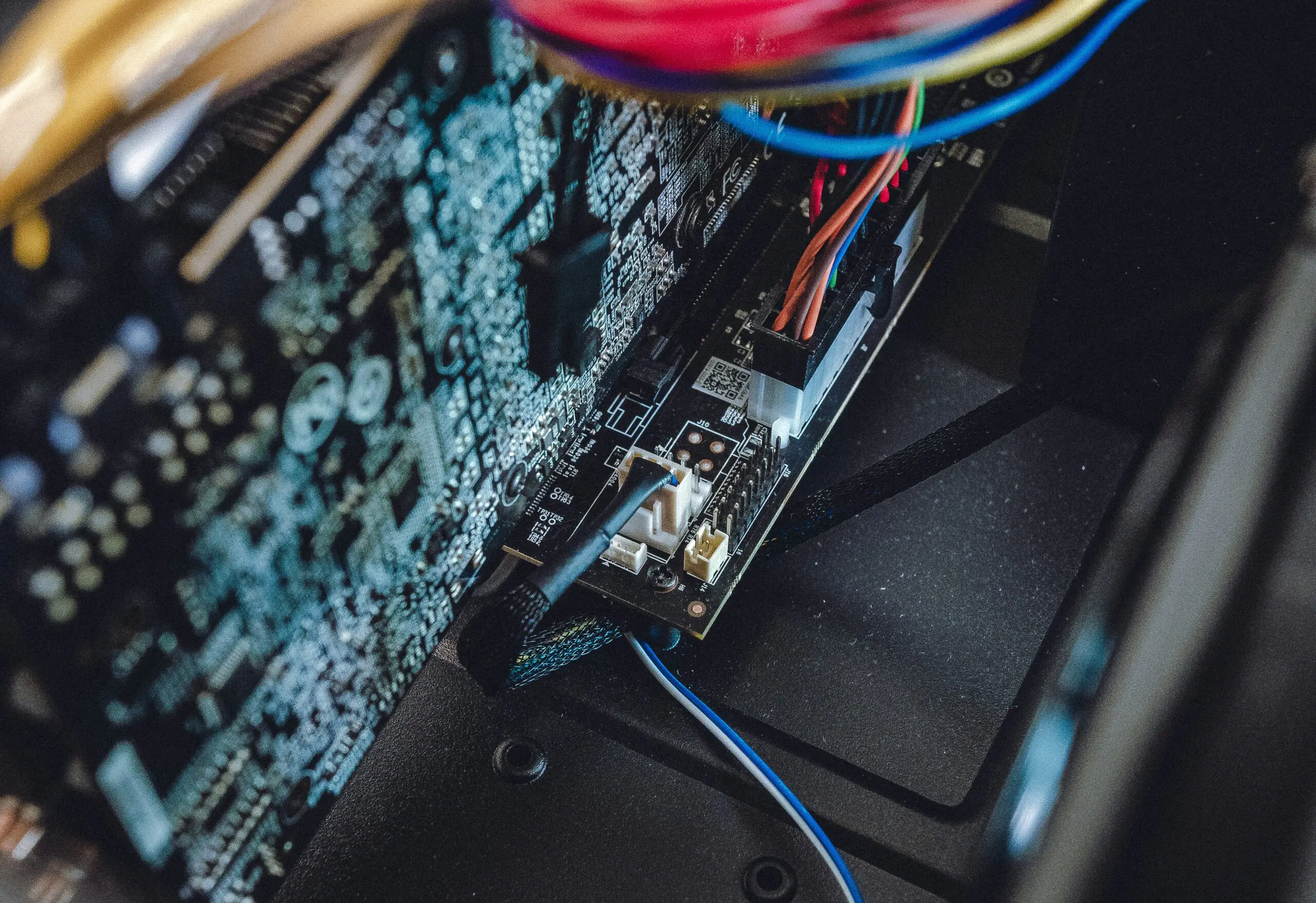 Stacks of de‑cabled desktops ready for shredding