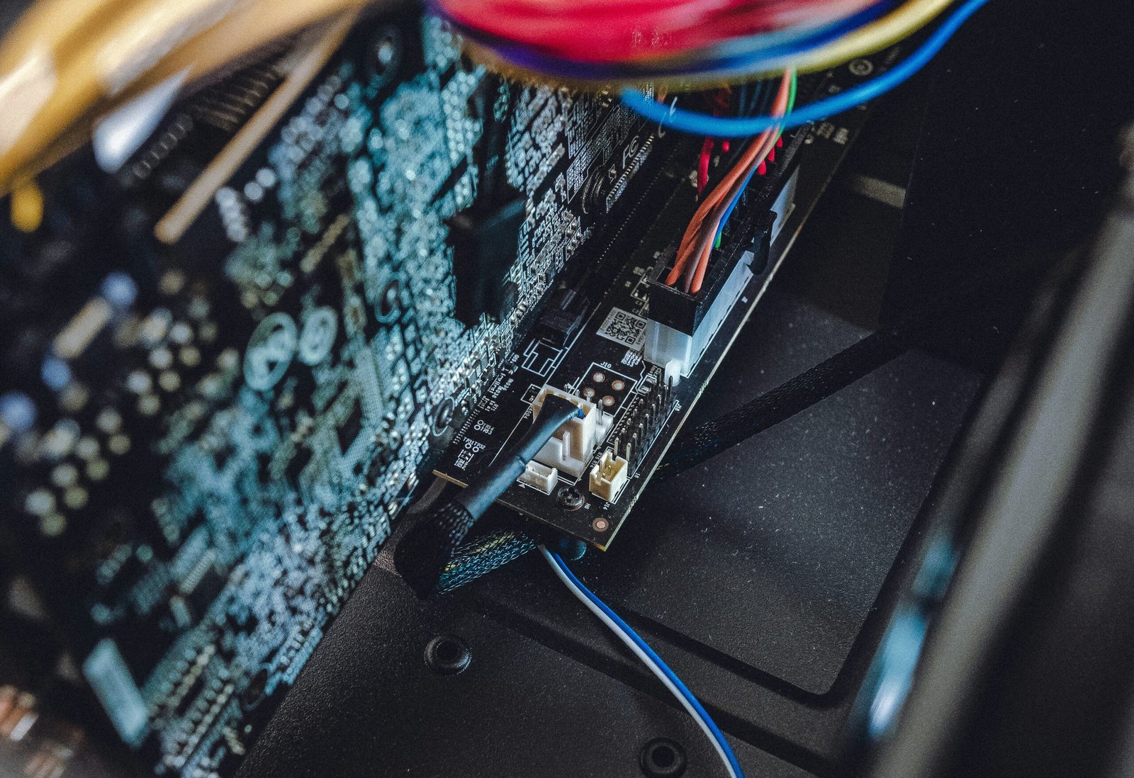 Stacks of de‑cabled desktops ready for shredding
